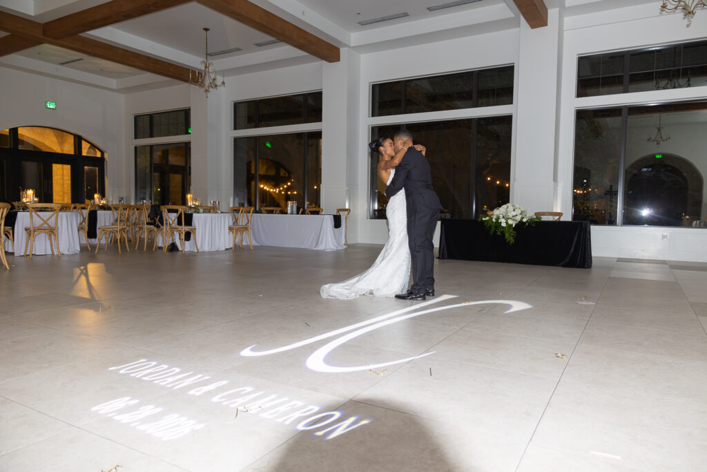 Jordan and Cameron alone on the dance floor for their private last dance